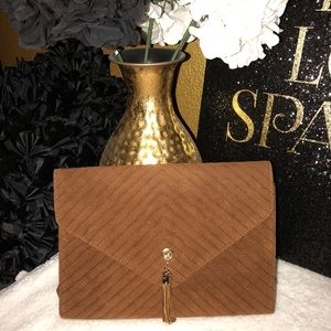 *Tan oversized clutch*